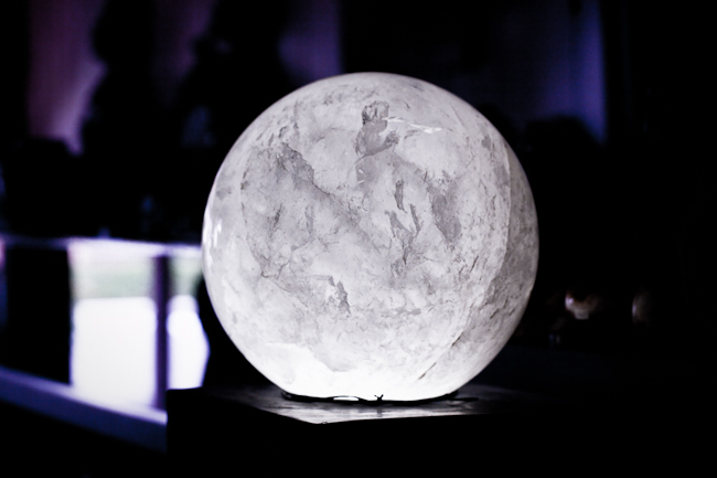 Quartz sphere from:  Brazil; Petrified wood pedestal from:  Indonesia
